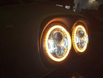 DUAL 7″ DAYMAKER 2014 & UP ORANGE HALO LED ROAD GLIDE Black Headlight Bezel