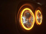 DUAL 7″ DAYMAKER 2014 & UP ORANGE HALO LED ROAD GLIDE Black Headlight Bezel