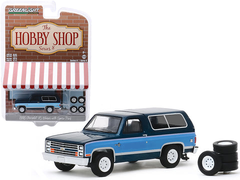 1986 Chevrolet K5 Blazer Dark Blue Metallic and Light Blue and Spare Tires \"The Hobby Shop\" Series 8 1/64 Diecast Model Car by Greenlight